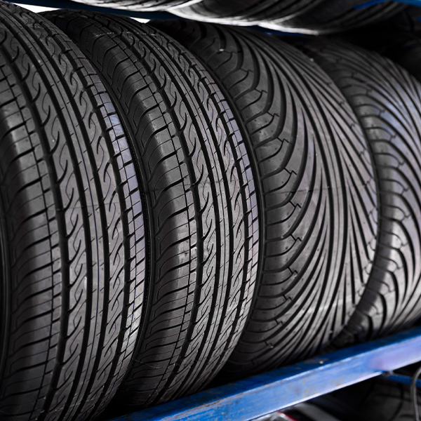 Close up new tyres on shelve in tire shop