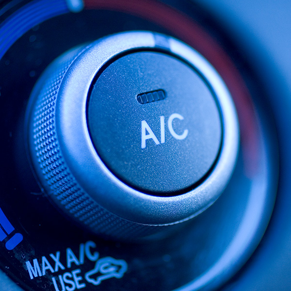Close up of air conditioning button in a car